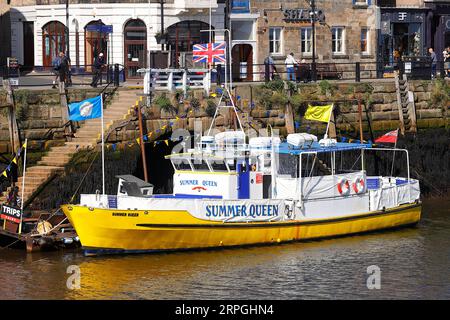 Summer Queen pleasure cruiser in Whitby, offers passenger rides around the coastline in North Yorkshire,UK Stock Photo