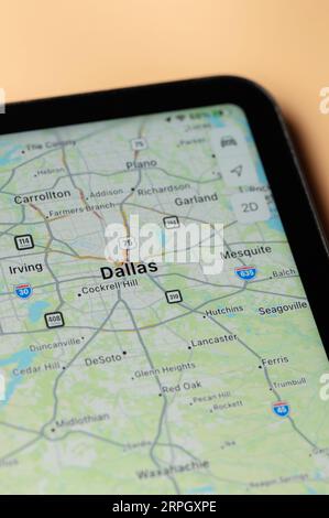 New York, USA - August 24, 2023: Car traffic in Dallas on google maps app on tablet screen close up view Stock Photo