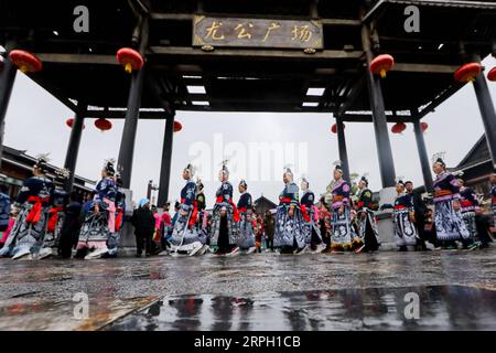 191026 -- DANZHAI, Oct. 26, 2019 -- People of the Miao ethnic group are on their way to perform a dance with Lusheng, a folk musical instrument made of bamboo pipes, during celebration of the Chixin festival in Danzhai County, Qiandongnan Miao and Dong Autonomous Prefecture, southwest China s Guizhou Province, Oct. 26, 2019. Local residents of the Miao ethnic group were joined by tourists on Saturday in celebrating their traditional Chixin festival for this year s harvest.  CHINA-GUIZHOU-DANZHAI-CHIXIN FESTIVAL-CELEBRATION CN OuxDongqu PUBLICATIONxNOTxINxCHN Stock Photo