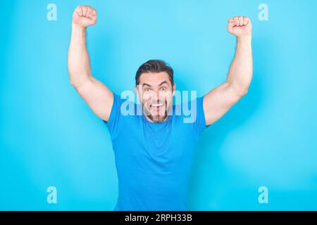 Emotional of excited man. Human reaction and emotions. Close up of excited man with facial expression. Happy and excited man doing winner gesture with Stock Photo