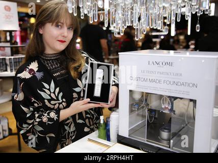 191029 -- PARIS, Oct. 29, 2019 -- A model presents the groundbreaking beauty product Le Teint Particulier Custom Made Foundation of Lancome, one of the world famous brands of L Oreal, at Galeries Lafayette in Paris, France, Oct. 25, 2019. L Oreal will participate in the second China International Import Expo CIIE scheduled for Nov. 5-10 in Shanghai, east China.  FRANCE-PARIS-CLICHY-L OREAL-CIIE GaoxJing PUBLICATIONxNOTxINxCHN Stock Photo