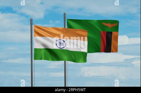 Zambia and India flags waving together in the wind on blue cloudy sky ...