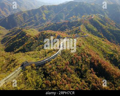 191101 -- BEIJING, Nov. 1, 2019 -- Aerial photo taken on Oct. 31, 2019 shows autumn scenery at the Mutianyu Great Wall in Beijing, capital of China.  XINHUA PHOTOS OF THE DAY ZhangxChenlin PUBLICATIONxNOTxINxCHN Stock Photo