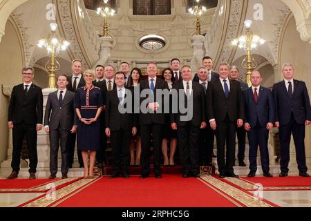 191104 -- BUCHAREST, Nov. 4, 2019 Xinhua -- Romanian President Klaus Iohannis C poses with new Prime Minister Ludovic Orban 4th L, front and members of the new cabinet after the swearing-in ceremony in Bucharest, Romania, on Nov. 4, 2019. Romania s new cabinet headed by National Liberal leader Ludovic Orban took the oath of office late Monday before President Klaus Iohannis at the Cotroceni Presidential Palace. Photo by Cristian Cristel/Xinhua ROMANIA-BUCHAREST-NEW GOVERNMENT-SWEARING-IN PUBLICATIONxNOTxINxCHN Stock Photo