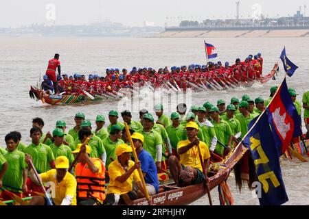 191110 -- PHNOM PENH, Nov. 10, 2019 Xinhua -- Participants race their boats in the Tonle Sap river during the Water Festival in Phnom Penh, Cambodia, Nov. 10, 2019. Tens of thousands of spectators flocked to the riverside here on Sunday for an 838-year-old boat racing tradition, which is held to celebrate the annual Water Festival. TO GO WITH Feature: Tens of thousands cheer for centuries-old boat race in Cambodian capital Photo by Sovannara/Xinhua CAMBODIA-PHNOM PENH-WATER FESTIVAL-CELEBRATION PUBLICATIONxNOTxINxCHN Stock Photo