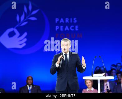 191112 -- PARIS, Nov. 12, 2019 -- French President Emmanuel Macron addresses the opening ceremony of Paris Peace Forum in Paris, France, Nov. 12, 2019. The second edition of the Paris Peace Forum opened here on Tuesday.  FRANCE-PARIS-PARIS PEACE FORUM ShenxHong PUBLICATIONxNOTxINxCHN Stock Photo