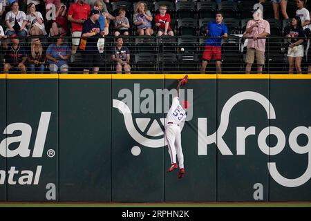 Texas Rangers right fielder Adolis Garcia (53) and left fielder Ezequiel  Duran (20) celebrate after closing the tenth inning of a baseball game  against the New York Yankees, Friday, June 23, 2023