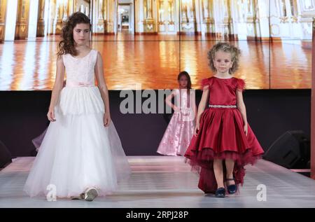 191123 -- MINSK, Nov. 23, 2019 Xinhua -- Children models present new children s wear during the Kids Fashion Zone, a children s wear sale exhibition for charity, in Minsk, Belarus, Nov. 23, 2019. The activity was held here to mark the World Children s Day of 2019. Xinhua/Henadz Zhinkov BELARUS-MINSK-KIDS FASHION ZONE-WORLD CHILDREN S DAY-CELEBRATION PUBLICATIONxNOTxINxCHN Stock Photo