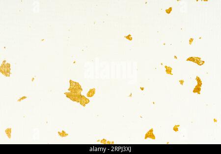 Paper with gold sheet texture as background. Stock Photo