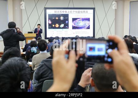 191128 -- BEIJING, Nov. 28, 2019 Xinhua -- Liu Jifeng, deputy director-general of the National Astronomical Observatory of the Chinese Academy of Sciences NAOC and the first author of the study, speaks during a press conference of the black hole LB-1 discovered with the Large Sky Area Multi-Object Fibre Spectroscopy Telescope LAMOST, in Beijing, capital of China, Nov. 27, 2019. A Chinese-led research team has discovered a surprisingly huge stellar black hole about 14,000 light years from Earth -- our backyard of the universe -- forcing scientists to re-examine how such black holes form. The te Stock Photo