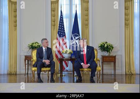 191203 -- LONDON, Dec. 3, 2019 Xinhua -- NATO General Secretary Jens StoltenbergL meets with U.S. President Donald Trump in London, Britain, on Dec. 3, 2019. -EDITORIAL USE ONLY-No material produced by NATO is to be sold, used for outside advertising or promotional purposes of any kind. Photos, videos and articles are released under the legally recognized terms of Fair Use to members of the press, academia, non-profits and the general public. No material is to be used in programs, articles or online publications of any kind that defame NATO or its member countries. Photo by NATO/Handout via Xi Stock Photo