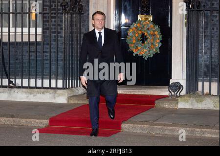 191203 -- LONDON, Dec. 3, 2019 Xinhua -- French President Emmanuel Macron leaves 10 Downing Street after a meeting with British Prime Minister Boris Johnson, German Chancellor Angela Merkel and Turkish President Recep Tayyip Erdogan in London, Britain, on Dec. 3, 2019. Photo by Ray Tang/Xinhua BRITAIN-LONDON-MEETING-FRANCE-GERMANY-TURKEY PUBLICATIONxNOTxINxCHN Stock Photo