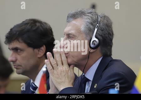 191206 -- BENTO GONCALVES, Dec. 6, 2019 -- Argentine President Mauricio Macri attends the 55th summit of the South American trade bloc Mercosur Southern Common Market in Bento Goncalves, Brazil, Dec. 5, 2019. The 55th summit of Mercosur, which gathers South American countries Brazil, Argentina, Paraguay and Uruguay, opened on Thursday in the southern Brazilian city of Bento Goncalves. As the host of the summit, Brazil s President Jair Bolsonaro highlighted the bloc s revival this year, thanks to trade agreements reached with the European Union EU and the European Free Trade Association EFTA. R Stock Photo