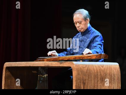 191207 -- BEIJING, Dec. 7, 2019 -- Musician Li Xiangting performs during a concert of the Guqin, a traditional Chinese musical instrument, at Central Conservatory of Music in Beijing, capital of China, Dec. 7, 2019. Photo by /Xinhua CHINA-BEIJING-GUQIN CONCERT CN RenxChao PUBLICATIONxNOTxINxCHN Stock Photo