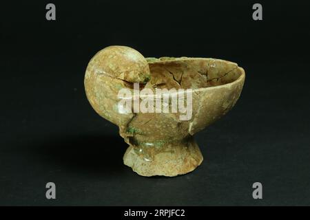 191208 -- NANCHANG, Dec. 8, 2019 -- Photo taken on Sept. 6, 2019 shows a relic unearthed from the ancient tombs excavated in Ganjiang New District, Nanchang, east China s Jiangxi Province. Archaeologists have excavated 73 ancient tombs dating back 1,400 years ago in east China s Jiangxi Province, the local institute of cultural relics and archeology said Saturday. It is believed that the majority of the discovered tombs were built in the Six Dynasties 222-589. The 8,000-square-meter site was discovered in June 2013. Excavation started in August 2018. CHINA-JIANGXI-ANCIENT TOMB CLUSTERS-DISCOVE Stock Photo