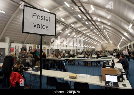 191213 -- LONDON, Dec. 13, 2019 -- Staff count ballots for the general election at Brunel University in Uxbridge, London, Britain, Dec. 12, 2019. An exit poll published after voting closed in the British election on Thursday night suggested the Conservatives are on course to win a massive Parliamentary majority. Photo by Ray Tang/Xinhua BRITAIN-LONDON-GENERAL ELECTION-VOTES COUNT HanxYan PUBLICATIONxNOTxINxCHN Stock Photo