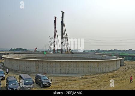 191215 -- DHAKA, Dec. 15, 2019 Xinhua -- Photo taken on Dec. 11, 2019 shows a sewage treatment plant under construction in Dhaka, Bangladesh. The construction of the China-funded Dasherkandi Sewage Treatment Plant Project , which started on August 2018, is now going on in full swing. The project includes sewage treatment plants, pumping stations and a sewage pipe network with a sewage treatment capacity of 500,000 cubic meters of sewage a day. Str/Xinhua BANGLADESH-DHAKA-SEWAGE-TREATMENT-PROJECT PUBLICATIONxNOTxINxCHN Stock Photo