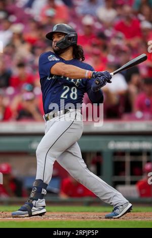 Seattle Mariners' Eugenio Suarez bats against the Cleveland Guardians  during the third inning of a baseball game, Sunday, April 9, 2023, in  Cleveland. (AP Photo/Ron Schwane Stock Photo - Alamy