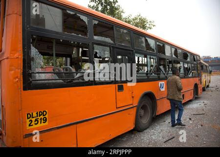 191217 -- NEW DELHI, Dec. 17, 2019 -- Photo taken on Dec. 17, 2019 shows a bus vandalised by protesters in New Delhi, India. Fresh violence was reported from parts of Delhi on Tuesday against the new Citizenship Amendment Act CAA, which was passed by the country s Parliament last week, TV media reports said.  INDIA-NEW DELHI-PROTESTS-NEW CITIZENSHIP ACT JavedxDar PUBLICATIONxNOTxINxCHN Stock Photo