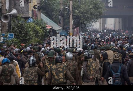 191217 -- NEW DELHI, Dec. 17, 2019 -- Indian policemen confront protesters in New Delhi, India, Dec. 17, 2019. Fresh violence was reported from parts of Delhi on Tuesday against the new Citizenship Amendment Act CAA, which was passed by the country s Parliament last week, TV media reports said.  INDIA-NEW DELHI-PROTESTS-NEW CITIZENSHIP ACT JavedxDar PUBLICATIONxNOTxINxCHN Stock Photo