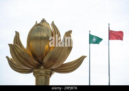 191218 -- MACAO, Dec. 18, 2019 Xinhua -- Photo taken on Dec. 13, 2019 shows the sculpture of golden lotus in Macao, south China. Xinhua/Cheong Kam Ka Xinhua Headlines: 20 yrs back with motherland, Macao model of one country, two systems success PUBLICATIONxNOTxINxCHN Stock Photo