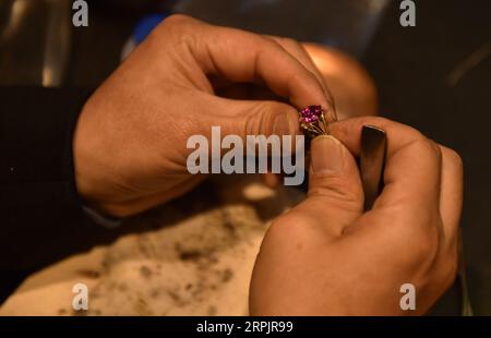 191218 -- BEIJING, Dec. 18, 2019 -- Dong Ruijing engraves Chinese ...