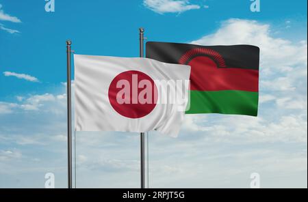 Malawi flag and Japan flag waving together on blue sky, two country cooperation concept Stock Photo