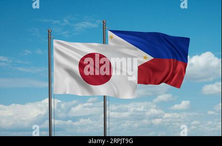 Philippines and Japan flag waving together in the wind on blue sky, two country cooperation concept Stock Photo