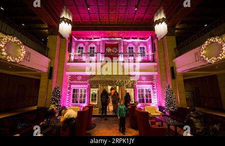 191225 -- TORONTO, Dec. 25, 2019 -- People view a life-size gingerbread house at the Fairmont Royal York Hotel in Toronto, Canada, Dec. 24, 2019. Standing more than 24 feet high and 6 feet deep with 500 pounds of delicious royal icing, the two-storey gingerbread house opens to the public during the holiday season. Photo by /Xinhua CANADA-TORONTO-CHRISTMAS DECORATION-LIFE-SIZE GINGERBREAD HOUSE ZouxZheng PUBLICATIONxNOTxINxCHN Stock Photo