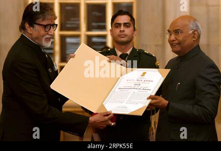 191230 -- NEW DELHI, Dec. 30, 2019 -- Indian President Ram Nath Kovind R presents Dadasaheb Phalke award to Indian superstar and veteran actor Amitabh Bachchan L during a function at the Indian presidential palace in New Delhi, India on Dec. 29, 2019. Amitabh Bachchan was Sunday honoured with the country s top cinema award -- Dadasaheb Phalke award for his outstanding contribution to the film industry, officials said. Str/Xinhua INDIA-NEW DELHI-AMITABH BACHCHAN-TOP CINEMA AWARD Stringer PUBLICATIONxNOTxINxCHN Stock Photo