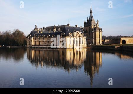 191230 -- PARIS, Dec. 30, 2019 -- Photo taken on Dec. 29, 2019 shows the Chantilly Castle, north of Paris, France. Festive decorations including majestic Christmas trees and a 12-metre long festive table adorned with party decorations are seen at the Chantilly Castle in celebration of Christmas and the upcoming New Year. The decorations will be presented until Jan. 5, 2020.  FRANCE-CHANTILLY CASTLE-FESTIVAL-DECORATIONS GaoxJing PUBLICATIONxNOTxINxCHN Stock Photo