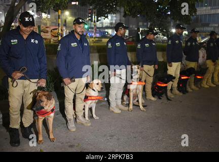 200101 -- DHAKA, Jan. 1, 2020 -- The dog squad of Dhaka Metropolitan Police DMP stand guard on the street in Dhaka, Bangladesh, Dec. 31, 2019. Bangladesh has tightened security in capital Dhaka in the run-up to New Year s Eve. Striking force and mobile teams will patrol sensitive Dhaka areas round-the-clock to avert any unpleasant incident. Str/Xinhua BANGLADESH-DHAKA-NEW YEAR S EVE-SECURITY-TIGHTENING Naim-ul-karim PUBLICATIONxNOTxINxCHN Stock Photo