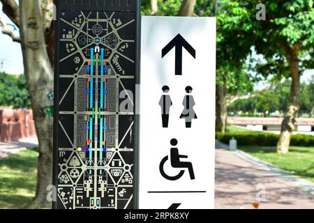 Restroom Map Key Sign Disabled restroom sign board with map at public park Stock Photo - Alamy