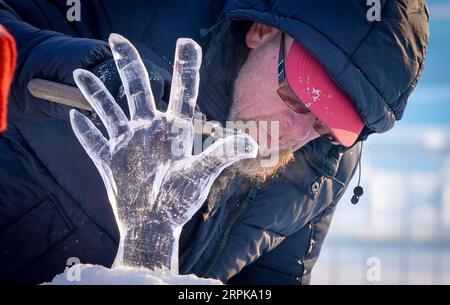 200105 -- BEIJING, Jan. 5, 2020 -- A sculptor takes part in the 9th China Harbin International Ice-Assemblage Championship in Harbin, northeast China s Heilongjiang Province, Jan. 3, 2020.  XINHUA PHOTOS OF THE DAY WangxSong PUBLICATIONxNOTxINxCHN Stock Photo