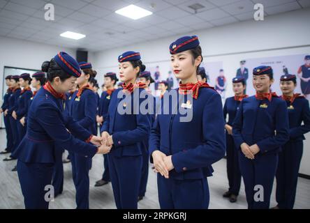 200111 -- WUHAN, Jan. 11, 2020 -- Newly recruited high-speed train attendants take part in a training course in central China s Hubei Province, Jan. 6, 2020. China, the world s most populated country, on Jan. 10 ushered in its largest annual migration, 15 days ahead of the Spring Festival, or the Lunar New Year. This year, three billion trips will be made during the travel rush from Jan. 10 to Feb. 18 for family reunions and travel, according to official forecast. The 40-day travel rush is known as Chunyun in Chinese. The Lunar New Year falls on Jan. 25 this year, earlier than previous years, Stock Photo