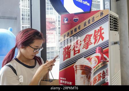 Luckin Coffee, the domestic coffee chain house, collaborates with liquor maker Kweichow Moutai, in developing the first Moutai-flavored coffee, drawin Stock Photo