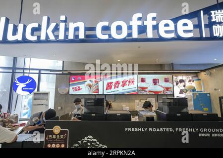 Luckin Coffee, the domestic coffee chain house, collaborates with liquor maker Kweichow Moutai, in developing the first Moutai-flavored coffee, drawin Stock Photo