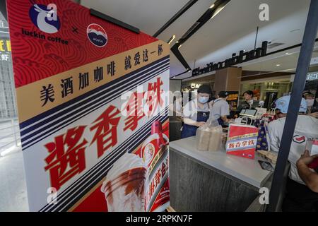 Luckin Coffee, the domestic coffee chain house, collaborates with liquor maker Kweichow Moutai, in developing the first Moutai-flavored coffee, drawin Stock Photo