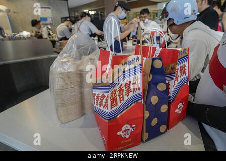 Luckin Coffee, the domestic coffee chain house, collaborates with liquor maker Kweichow Moutai, in developing the first Moutai-flavored coffee, drawin Stock Photo