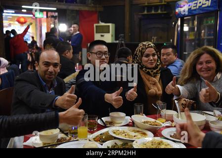 200126 -- DAMASCUS, Jan. 26, 2020 -- Some Syrians and their Chinese friends gather at a Chinese restaurant to celebrate the Chinese Lunar New Year in Damascus, Syria on Jan. 24, 2020. TO GO WITH Feature: Chinese New Year celebrated in Damascus Photo by /Xinhua SYRIA-DAMASCUS-CHINESE NEW YEAR AmmarxSafarjalani PUBLICATIONxNOTxINxCHN Stock Photo