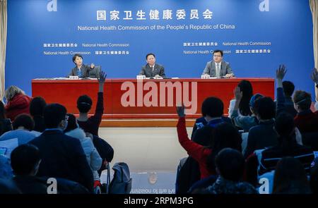 200128 -- BEIJING, Jan. 28, 2020 -- Photo taken on Jan. 27, 2020 shows a press conference held by the National Health Commission in Beijing, capital of China. The seven-day Spring Festival vacation, scheduled to end on Jan. 30, was extended to Feb. 2. Universities, primary and middle schools and kindergartens across the country will postpone the opening of the spring semester until further notice, according to the General Office of the State Council. Community-based public places where crowds gather should be strictly cleaned and disinfected and have good ventilation in order to create an envi Stock Photo