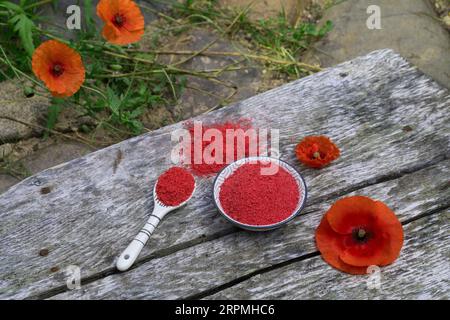 Common poppy, Corn poppy, Red poppy (Papaver rhoeas), selfmade flower salt made from eatable flowers Stock Photo