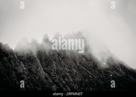 Cradle Mountain rocky summit detail on a cool stormy spring afternoon near sunset in Cradle Mountain, Tasmania, Australia Stock Photo