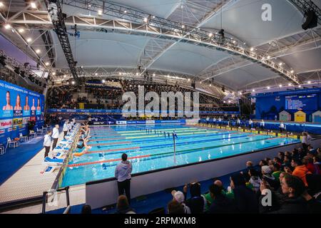 MELBOURNE, AUSTRALIA, DECEMBER 13: Athletes competing in heats on day one of the 2022 FINA World Short Course Swimming Championships at Melbourne Stock Photo