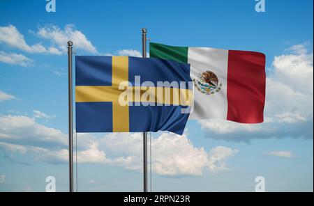 Mexico flag and Sweden flag waving together on blue sky, two country cooperation concept Stock Photo