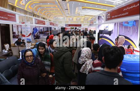 200220 -- KABUL, Feb. 20, 2020 -- People visit an exhibition presenting Afghan and Iranian products in Kabul, capital of Afghanistan, Feb. 20, 2020. Photo by Rahmatullah Alizadah/Xinhua AFGHANISTAN-KABUL-AFGHAN-IRAN-PRODUCT-EXHIBITION ZouxDelu PUBLICATIONxNOTxINxCHN Stock Photo