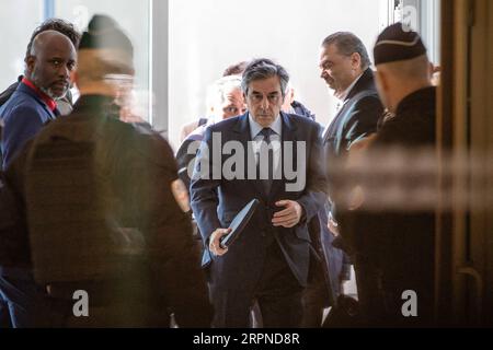 200226 -- PARIS, Feb. 26, 2020 Xinhua -- Former French Prime Minister Francois Fillon C arrives at the Paris Courthouse for the opening hearing of his trial over fake job allegations in Paris, France, on Feb. 26, 2020. Photo by Aurelien Morissard/Xinhua FRANCE-PARIS-FILLON-TRIAL PUBLICATIONxNOTxINxCHN Stock Photo