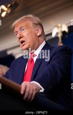 200229 -- WASHINGTON, Feb. 29, 2020 -- U.S. President Donald Trump attends a press conference at the White House in Washington D.C., the United States, on Feb. 29, 2020. The United States on Saturday announced additional travel restrictions on Iran and raised travel advisories for certain areas of Italy and South Korea over coronavirus concerns.  U.S.-WASHINGTON D.C.-PRESS CONFERENCE-CORONAVIRUS LiuxJie PUBLICATIONxNOTxINxCHN Stock Photo