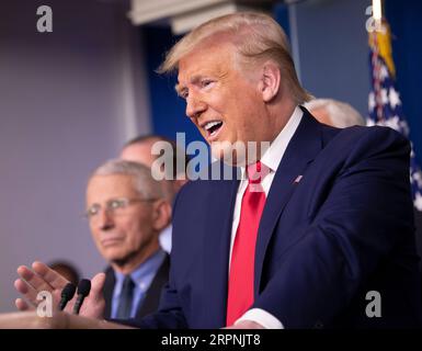 200229 -- WASHINGTON, Feb. 29, 2020 -- U.S. President Donald Trump Front attends a press conference at the White House in Washington D.C., the United States, on Feb. 29, 2020. The United States on Saturday announced additional travel restrictions on Iran and raised travel advisories for certain areas of Italy and South Korea over coronavirus concerns.  U.S.-WASHINGTON D.C.-PRESS CONFERENCE-CORONAVIRUS LiuxJie PUBLICATIONxNOTxINxCHN Stock Photo