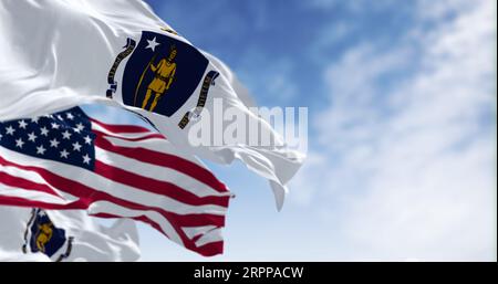 The flags of Massachusetts and the United States waving in the wind on a clear day. Patriotism and identity concept. 3d illustration render. Rippled f Stock Photo